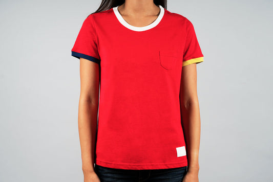Red Sports Tee with white neckline, navy and gold sleeve stripes, front pocket detail on women's casual shirt.